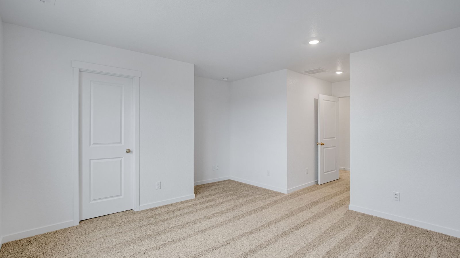 large primary bedroom in new home