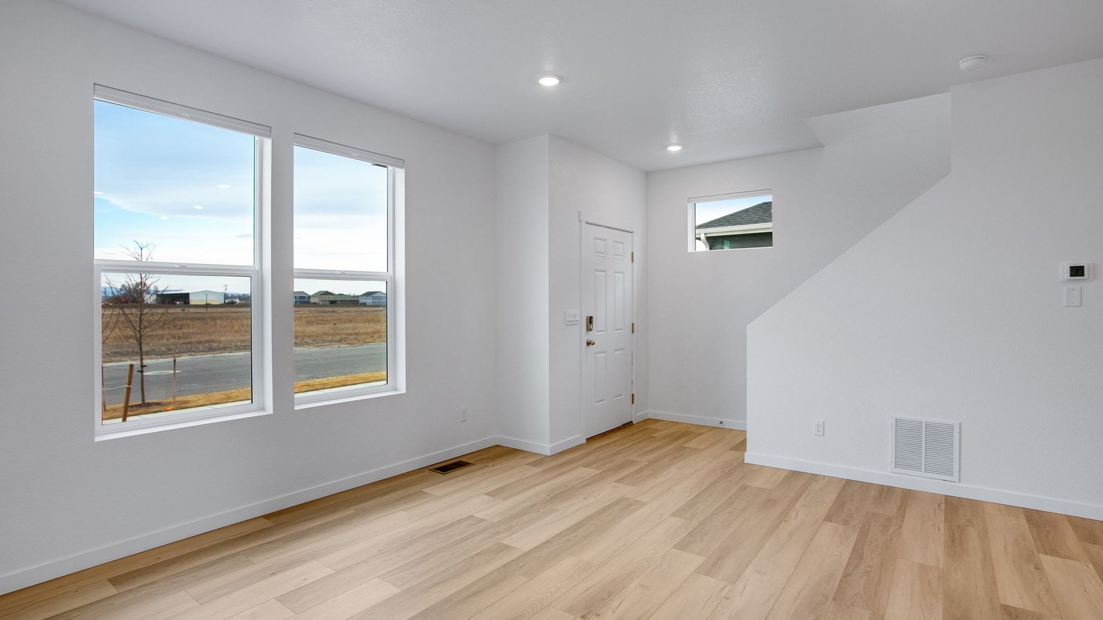 Bright and inviting great room designed for gathering, entertaining, and everyday living.