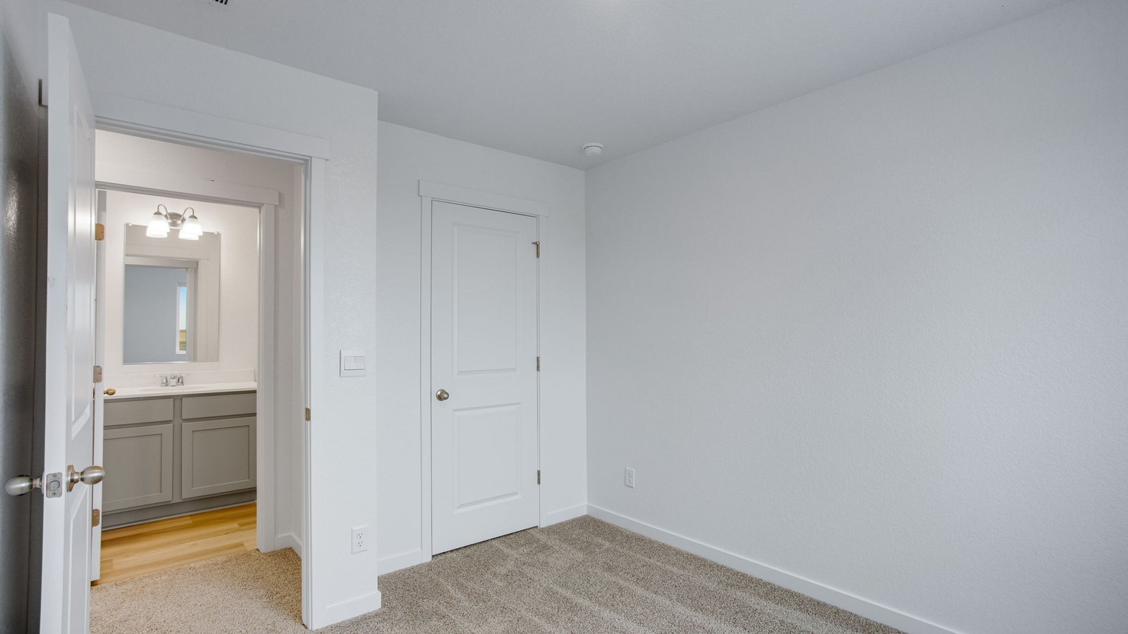 Bright and spacious owner's suite designed for comfort and privacy.