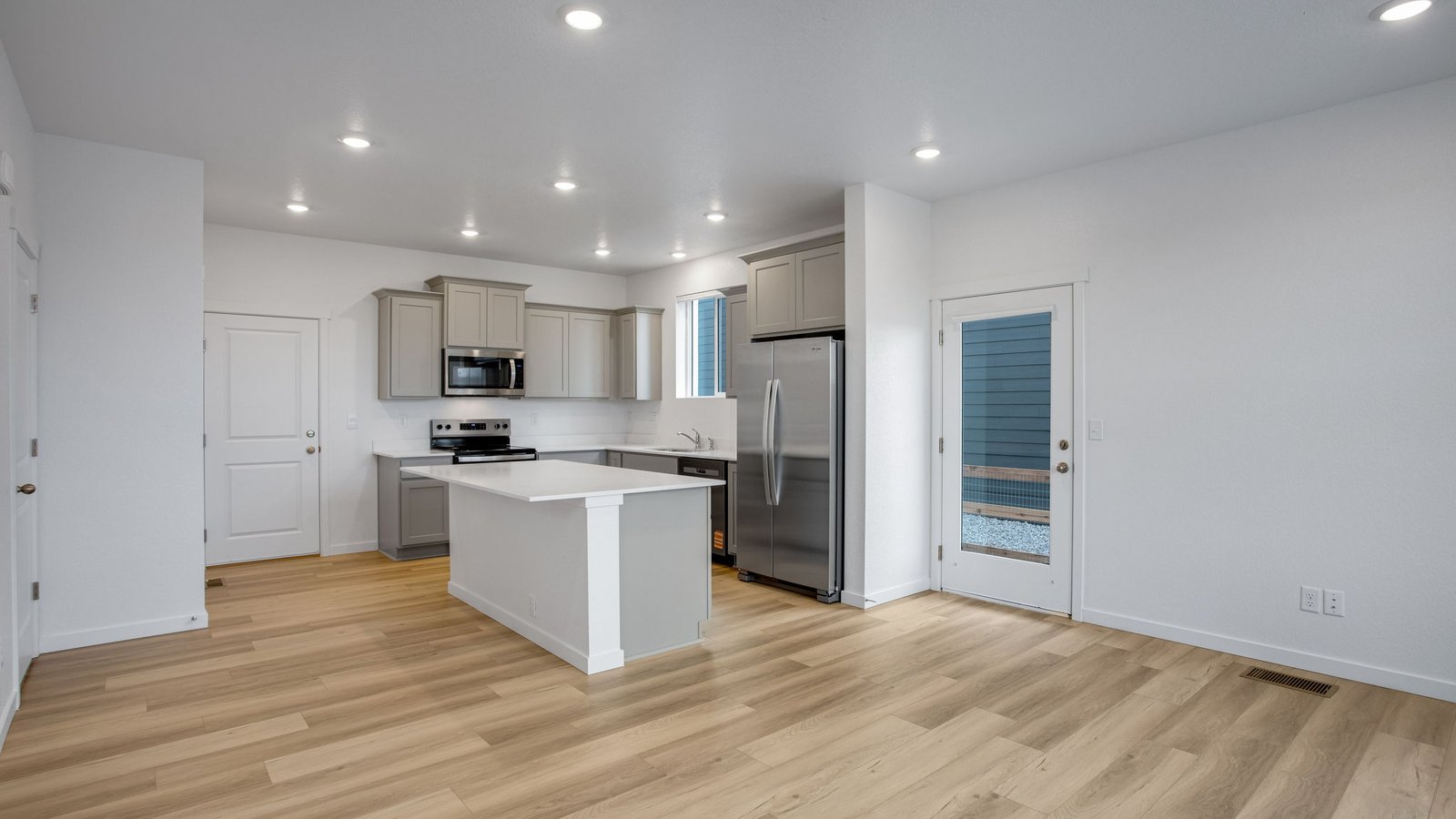 Stylish kitchen with generous storage, expansive countertops, and a functional layout for everyday living.