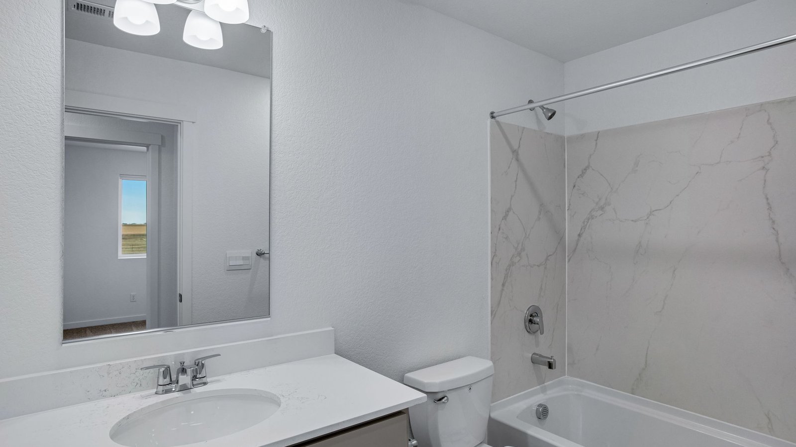 Bathroom with modern fixtures and a functional layout designed for everyday convenience.