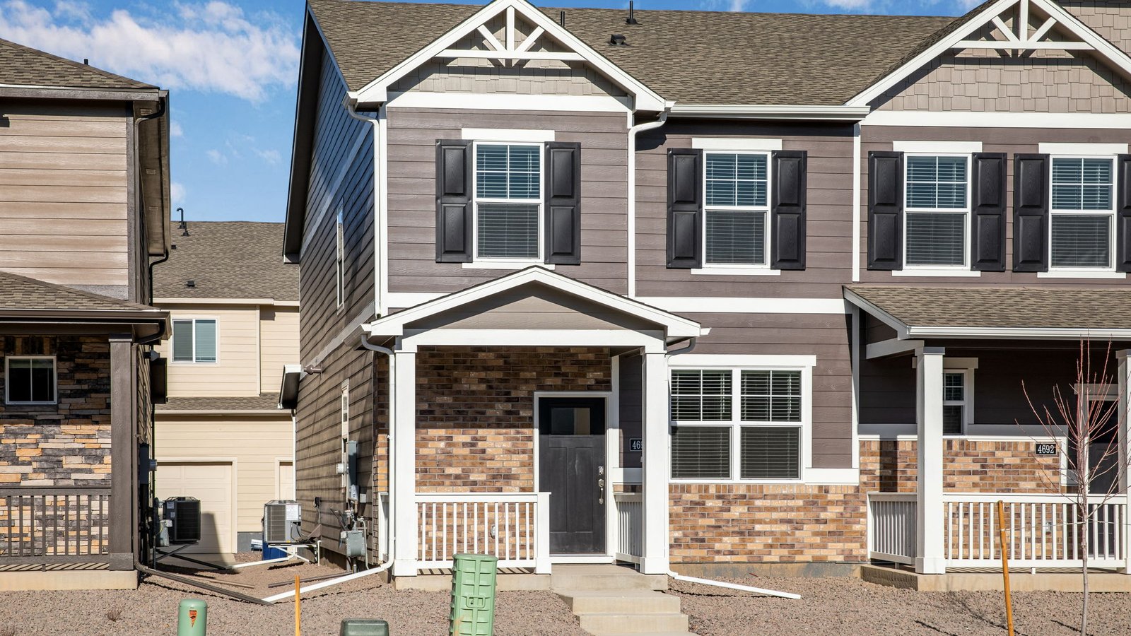 Exterior view of the Melbourne floorplan paired home in the Revere at Johnstown community.