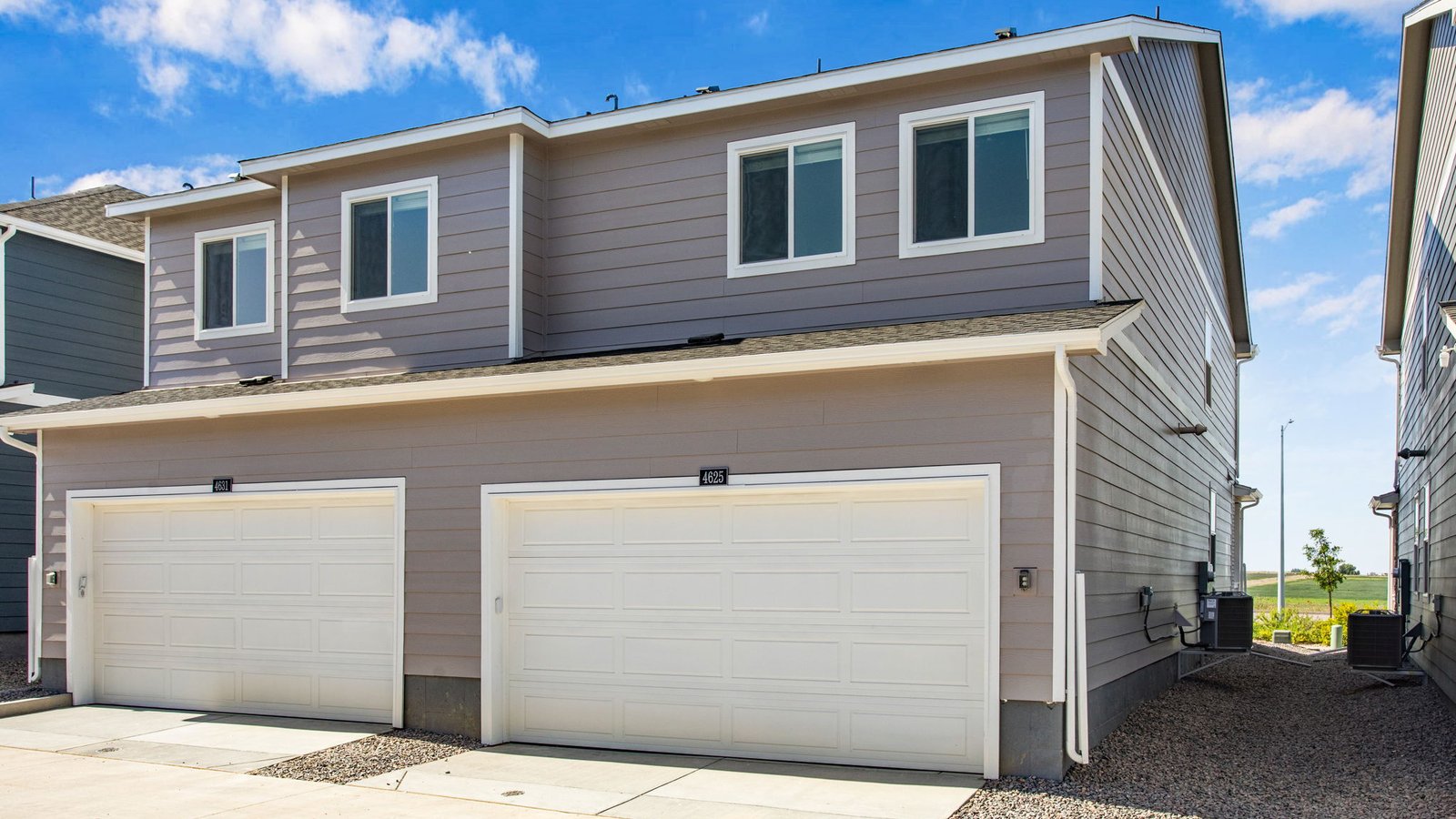 Charming paired home in Johnstown with thoughtfully designed outdoor spaces and welcoming curb appeal.