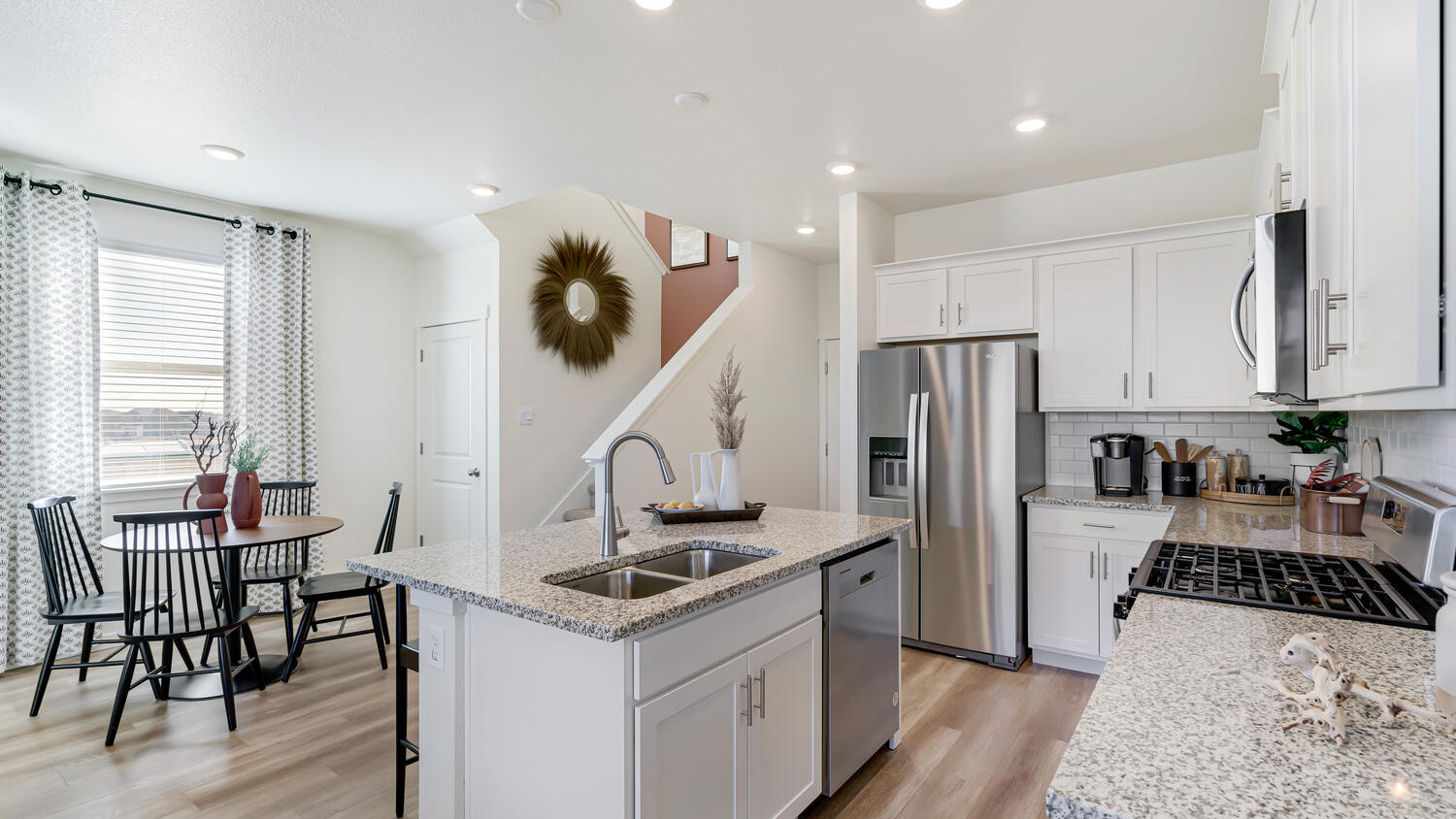 Spacious center island serving as the heart of the kitchen for entertaining and meal preparation.