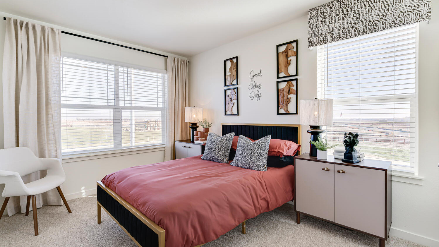 Bright secondary bedroom with flexible space for family, guests, or a home office.