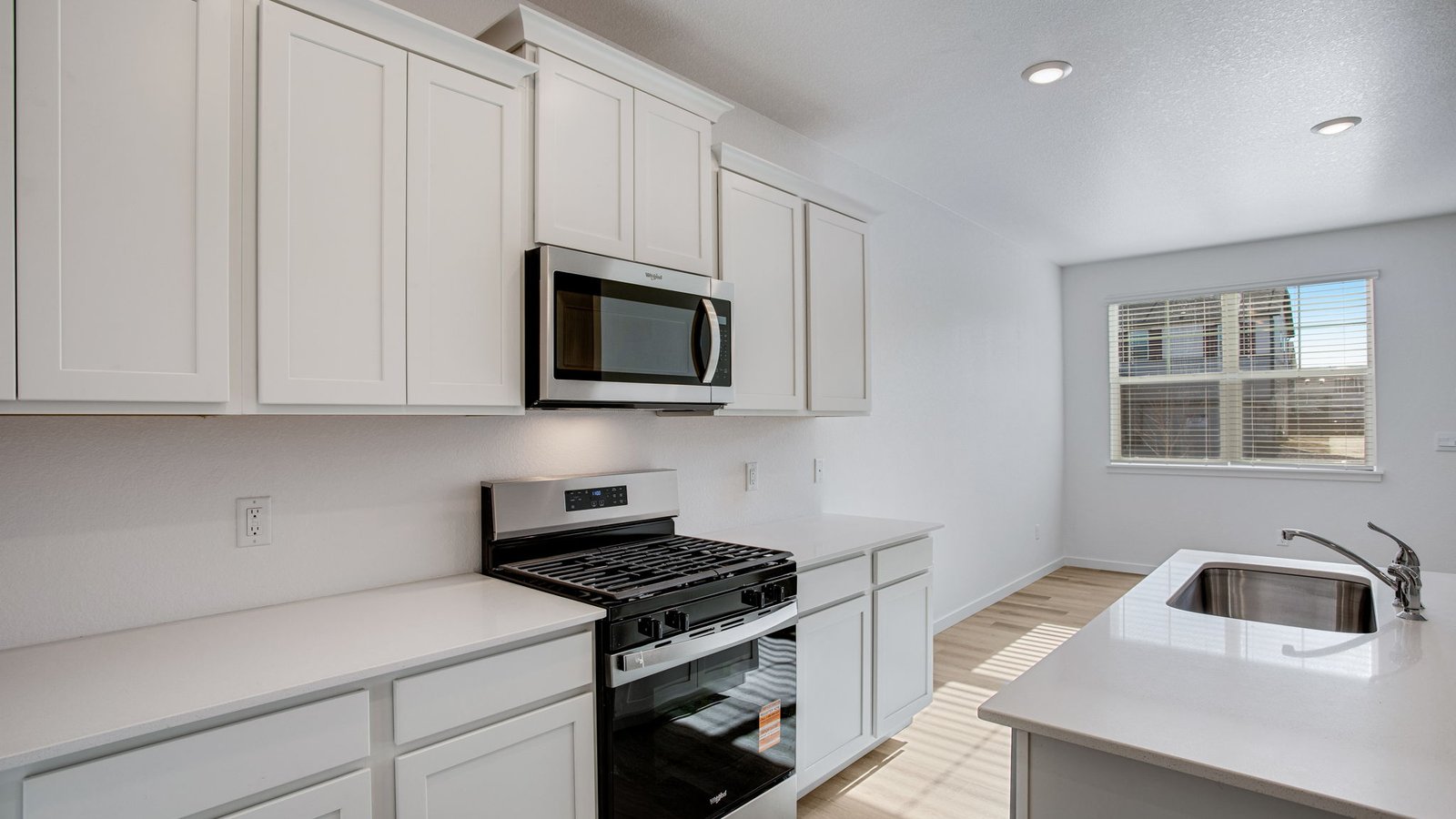 kitchen with microwave and stove