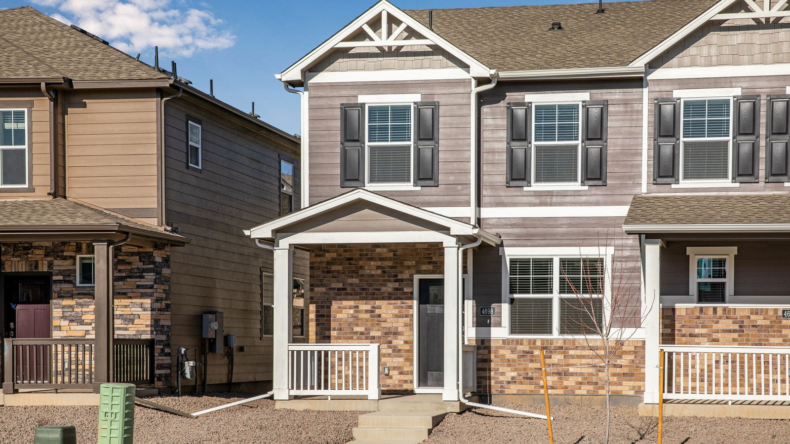 exterior of paired home with porch in Johnstown, co