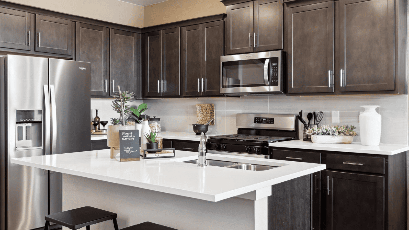 Large kitchen island in paired home at Revere at Johnstown by D.R. HOrton