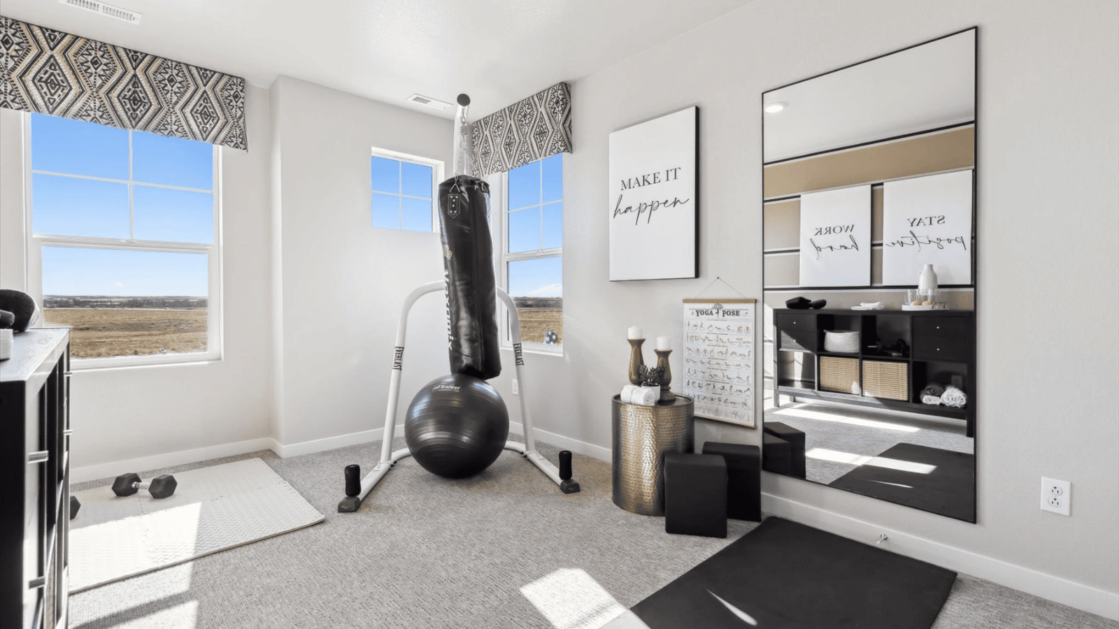 Bedroom turned into fitness room in new paired home in Revere at Johnstown by D.R. Horton