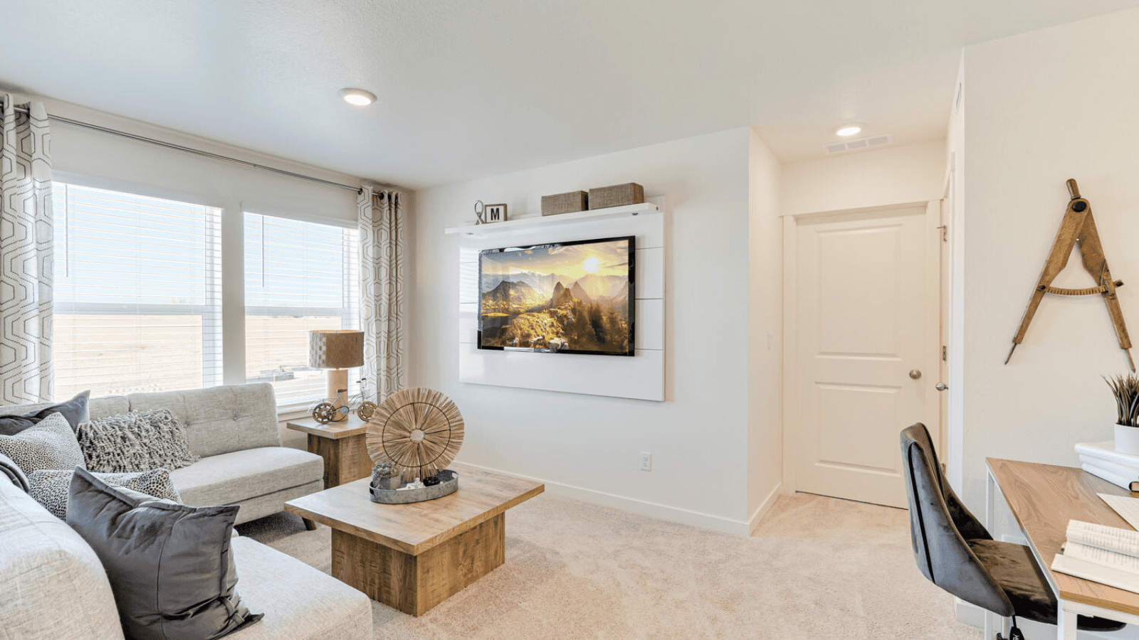 Upstairs loft with large window in new D.R. Horton home in Johnstown, CO