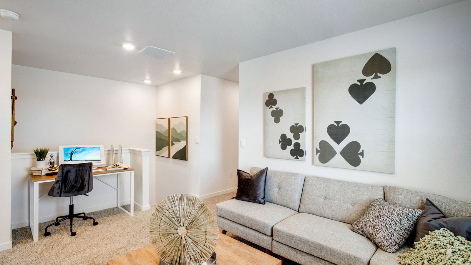 Open loft in the Muirfield home providing flexible living space for work or relaxation.