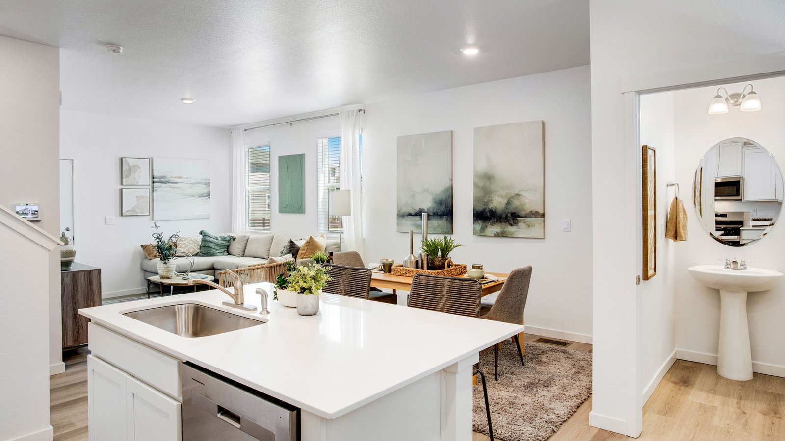 Bright kitchen in the Muirfield home with ample counter space, contemporary finishes, and room for entertaining.