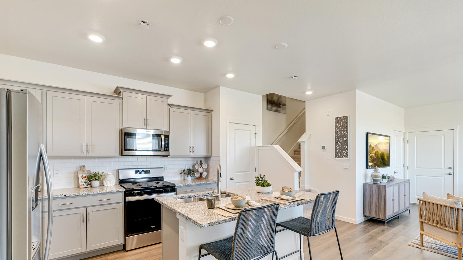 Bright kitchen in the Muirfield home with ample counter space, contemporary finishes, and room for entertaining.