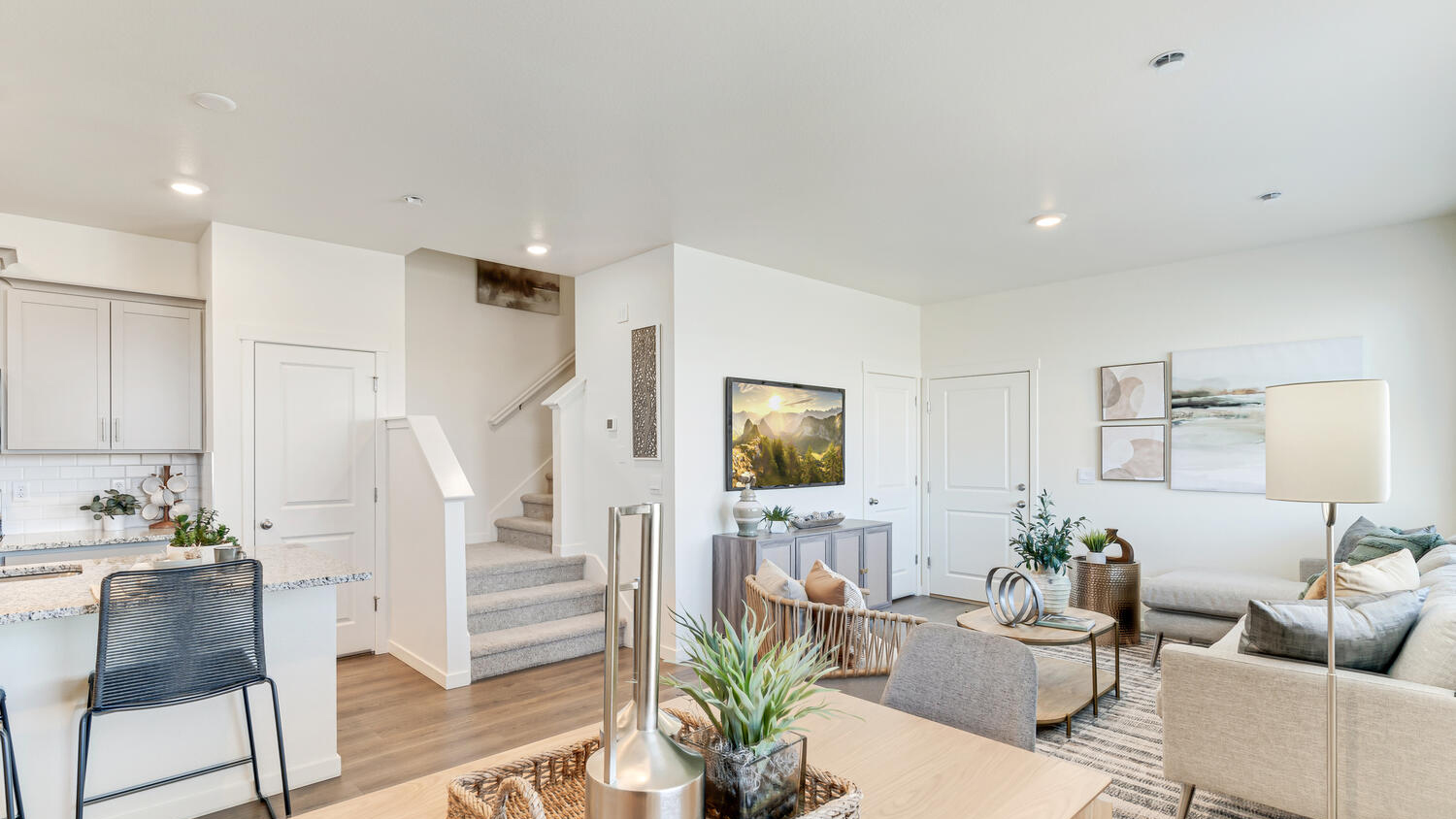 Spacious living room in the Muirfield floor plan featuring an open layout and abundant natural light.