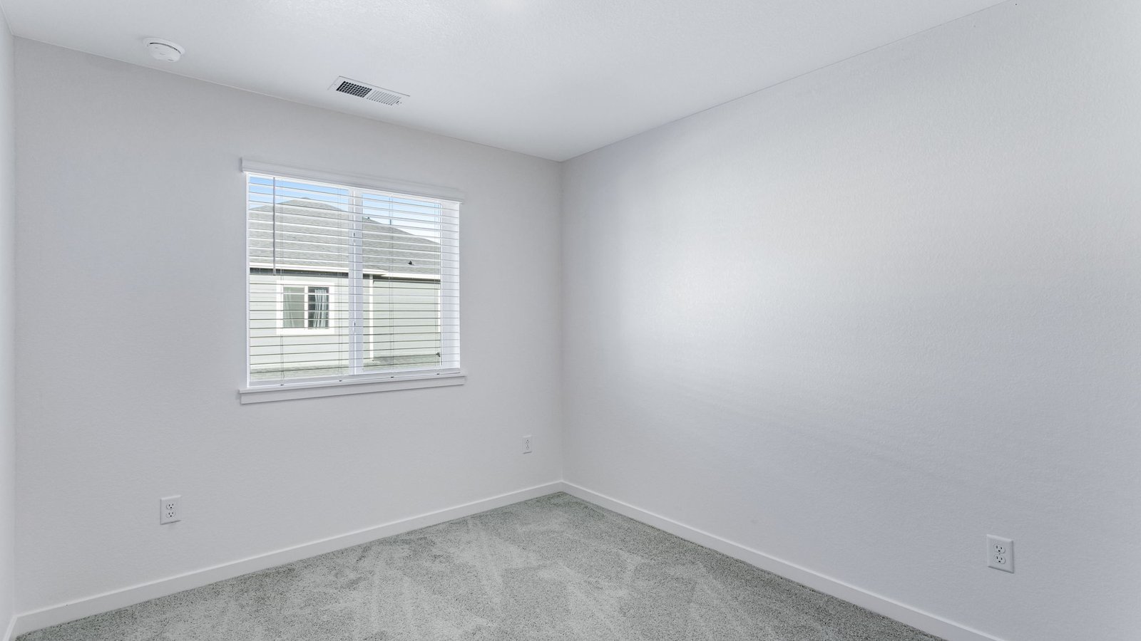 secondary bedroom with large window