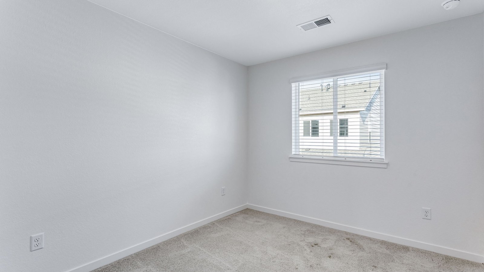 third bedroom with large window