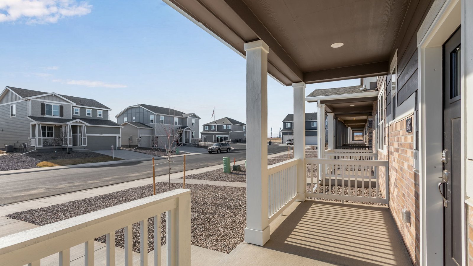 front porch of new construction paired home johnstown, co