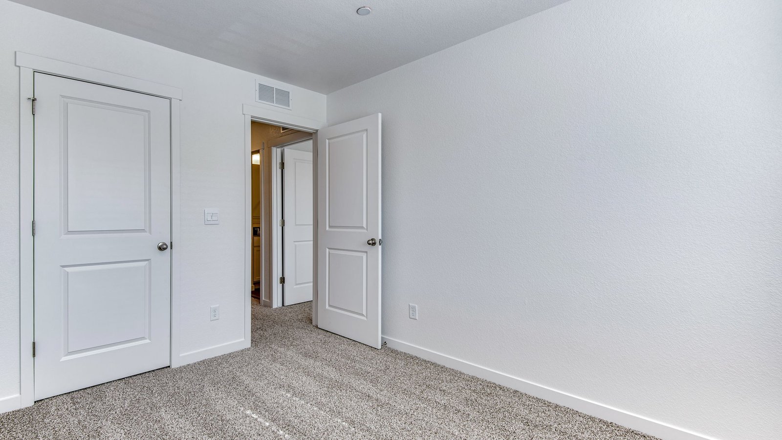 Guest bedroom in new D.R. Horton home