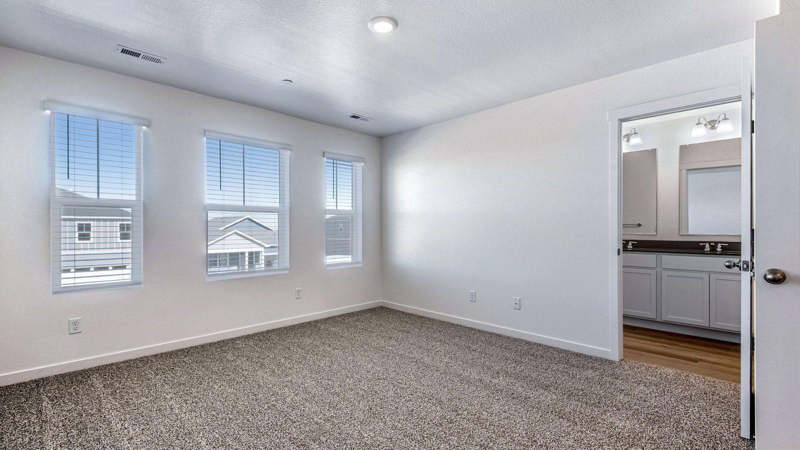 Primary bedroom in new D.R. Horton home
