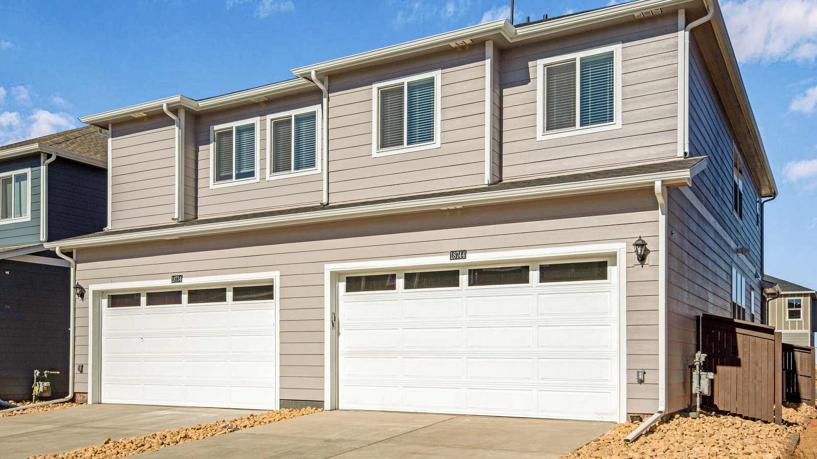 Two car garage of new paired home in Johnstown, CO