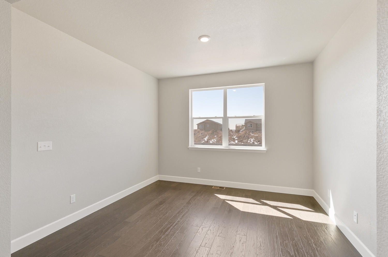 bedroom with a window and carpet