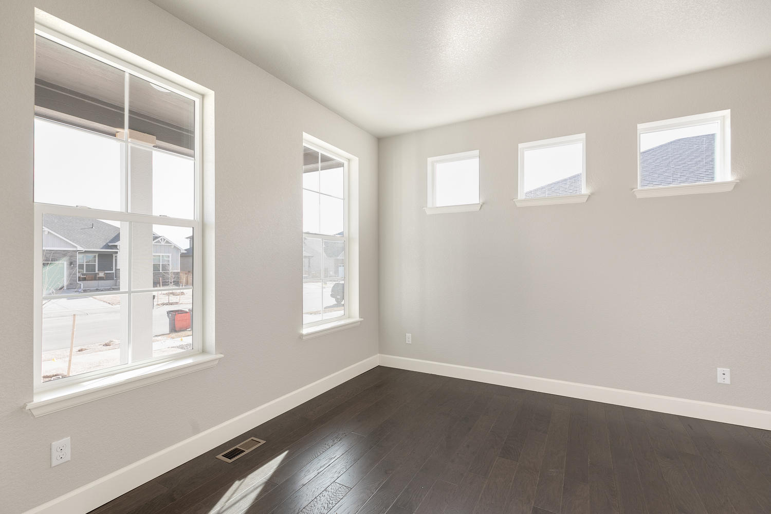 study with windows and wood floor