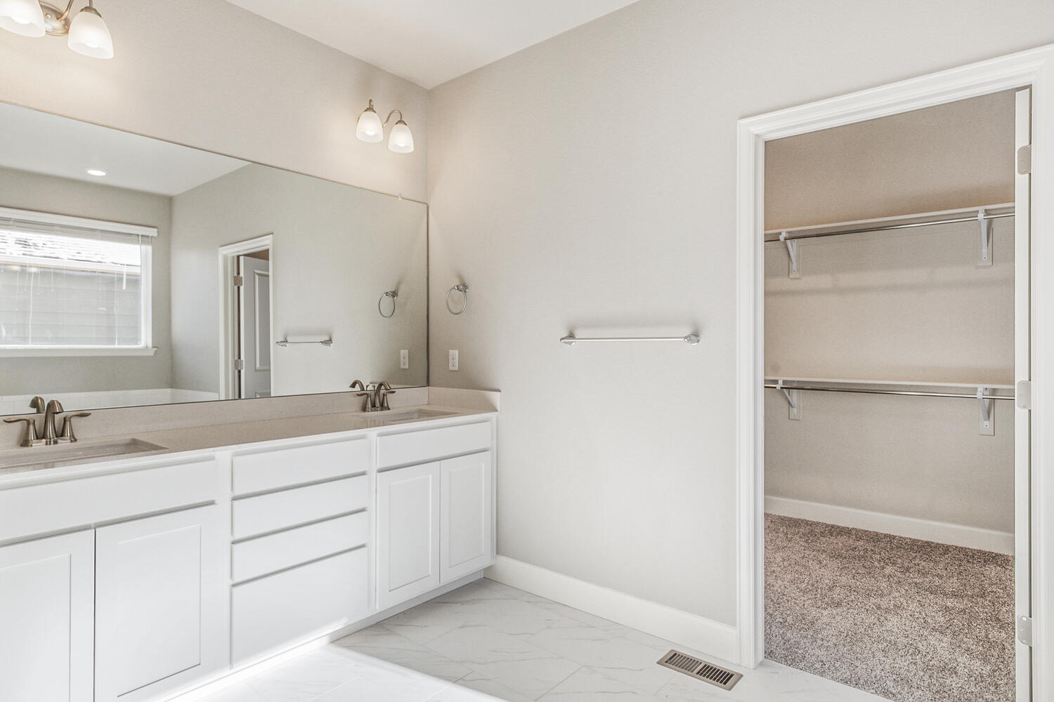 white cabinet bathroom with closet