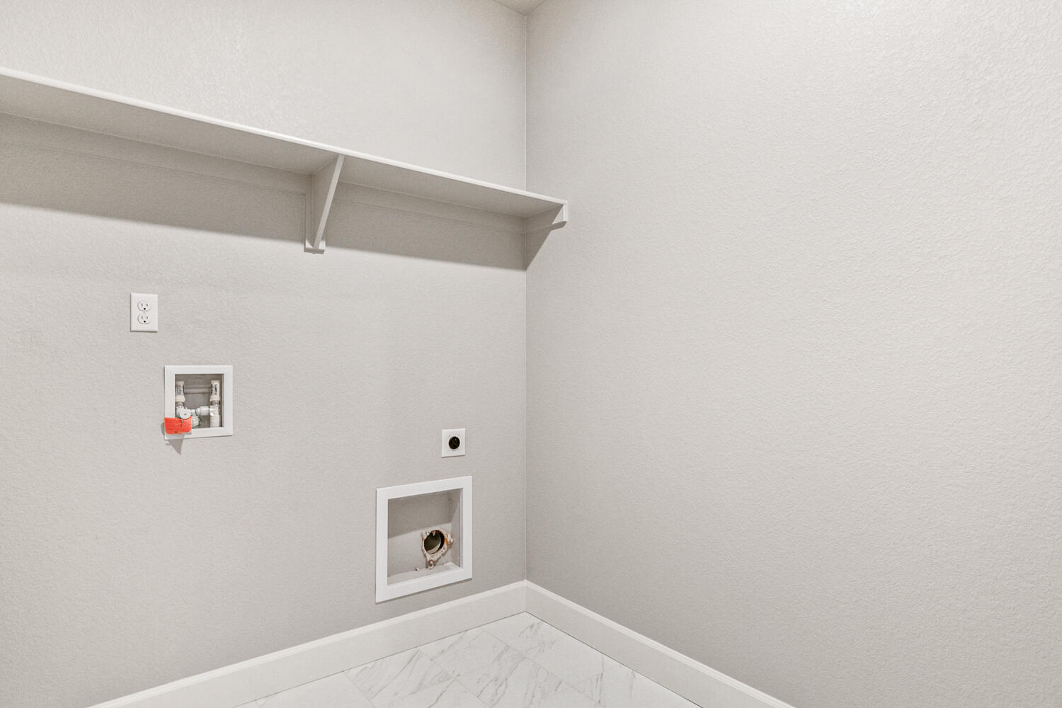 laundry room with washer and dryer hook up