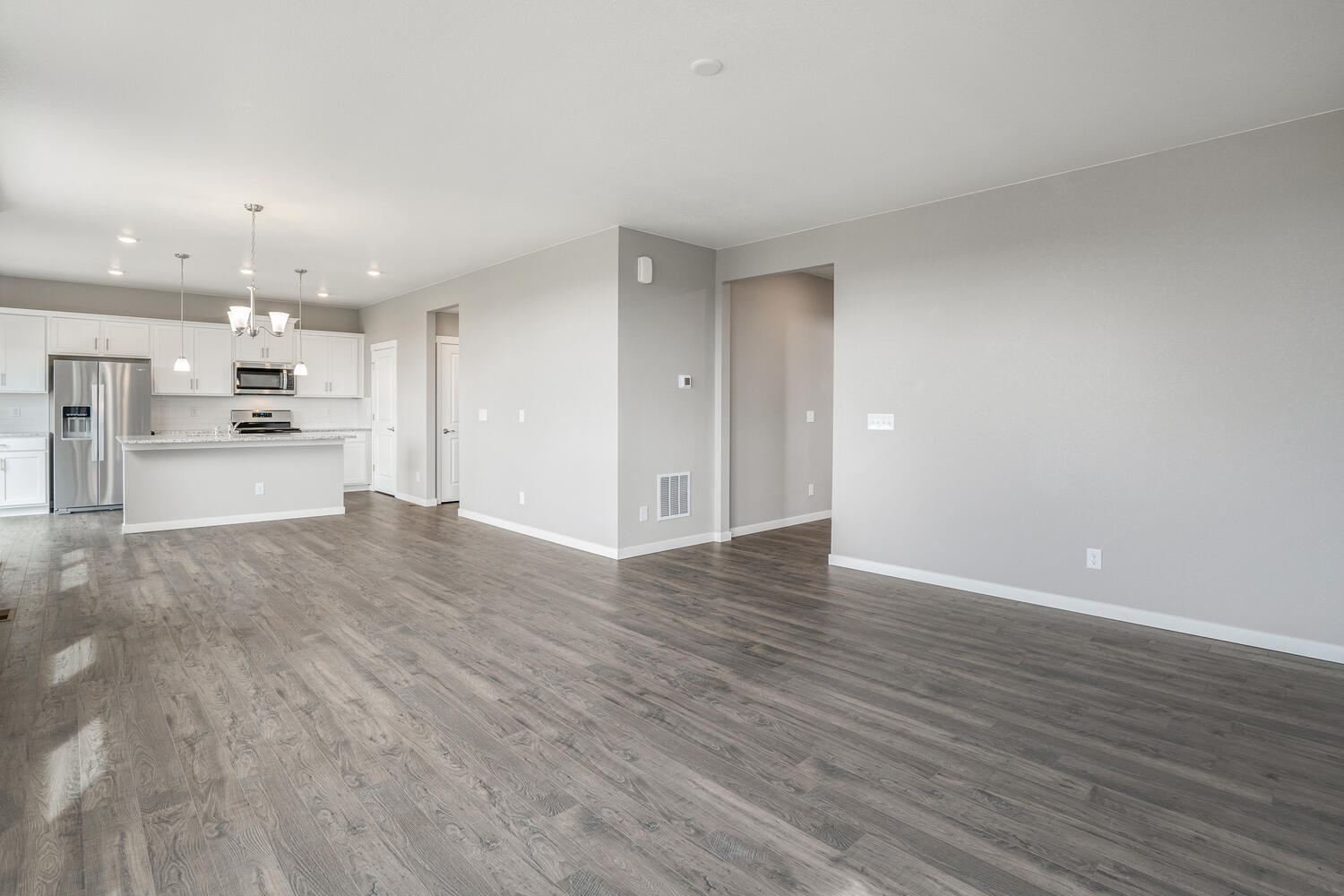 open space living room and  kitchen with hard wood floor