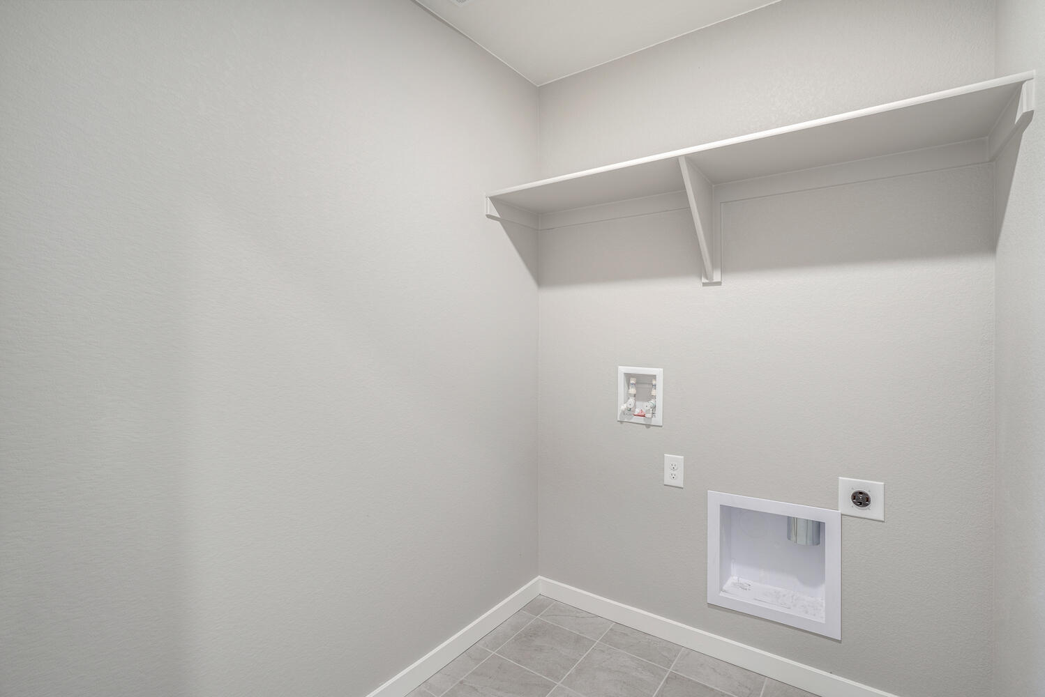 laundry room with washer and dryer hook up