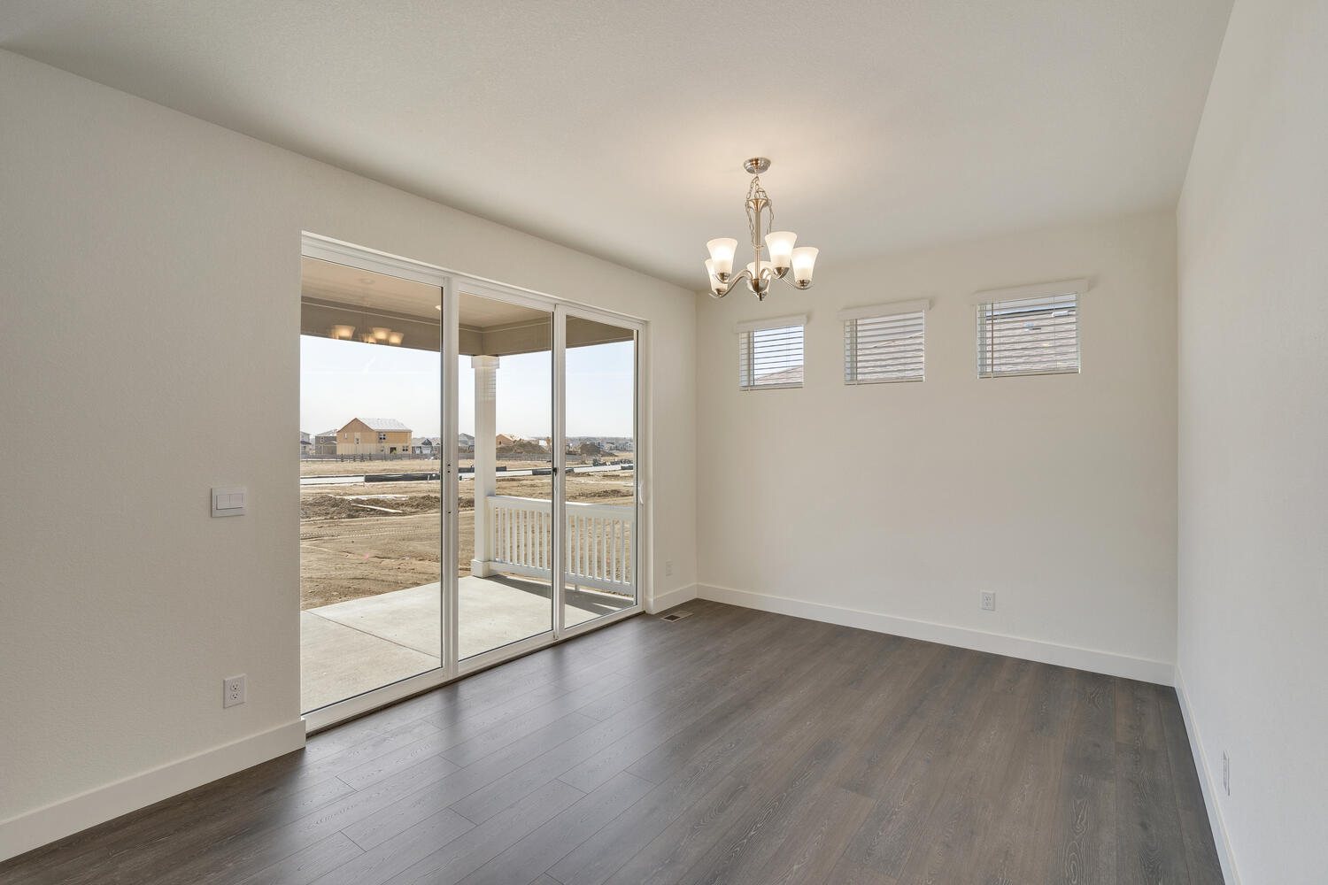 dining room with a back door and ceiling light