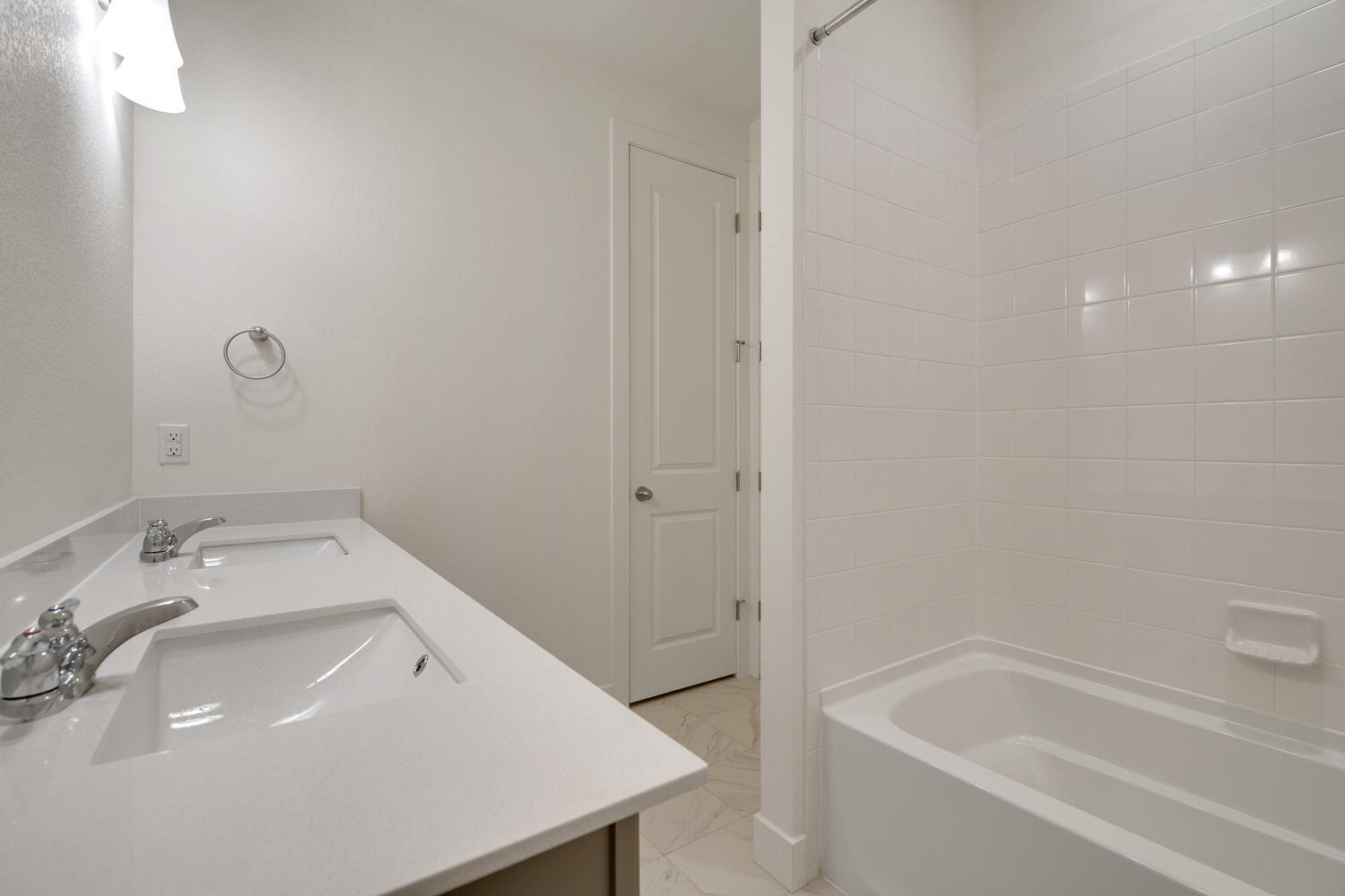 bathroom with a tub and sink