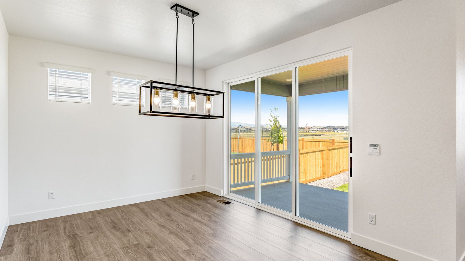 Bright dining space in the Grover home designed for gathering with family and friends.