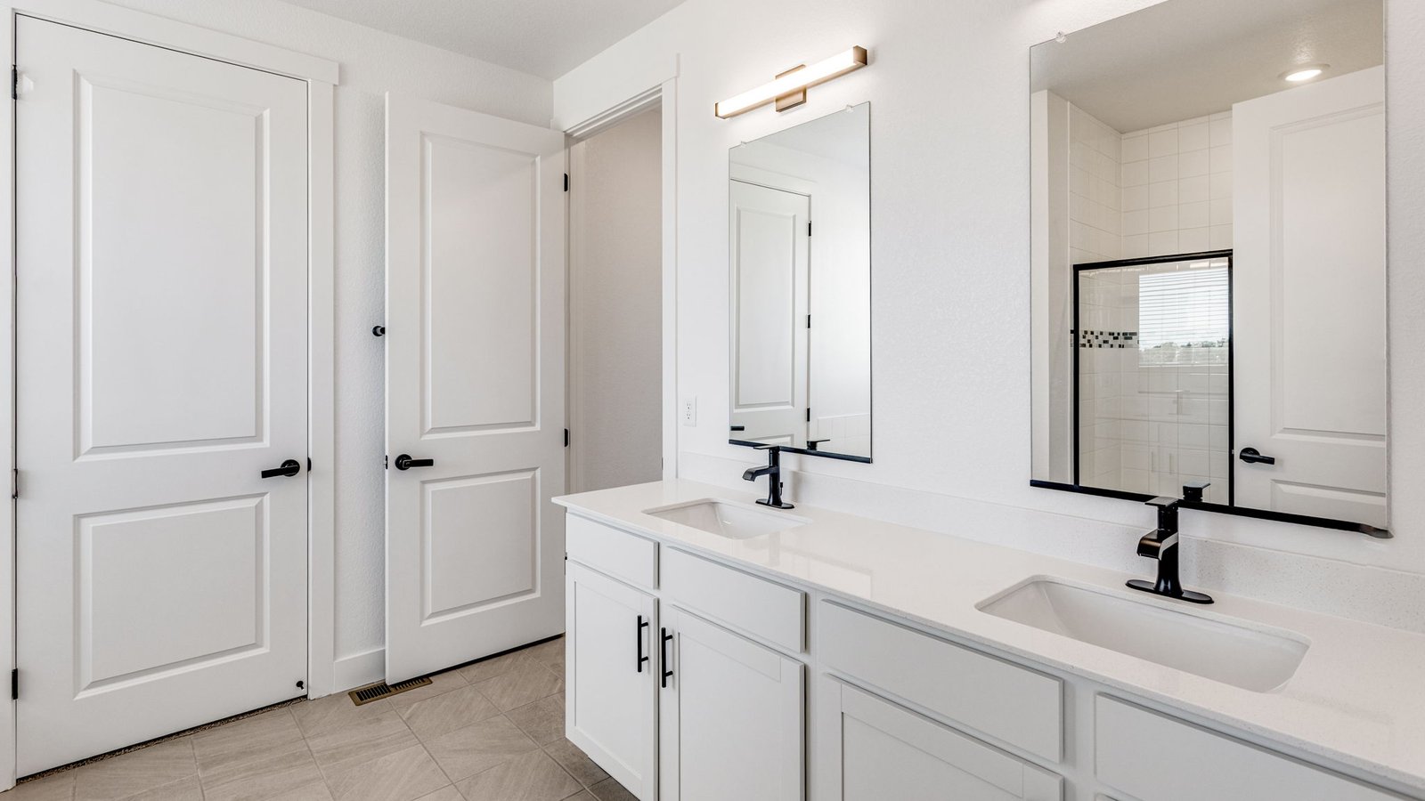Modern bathroom in the Grover floor plan featuring stylish fixtures and a clean, contemporary design.
