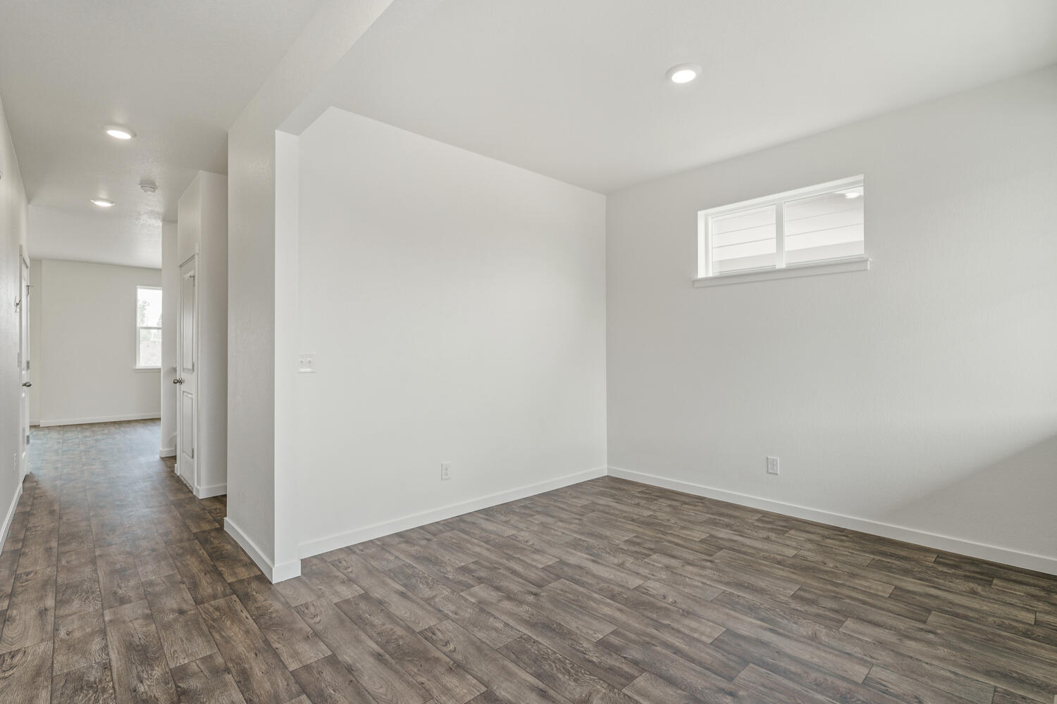 entry way and a study with a window
