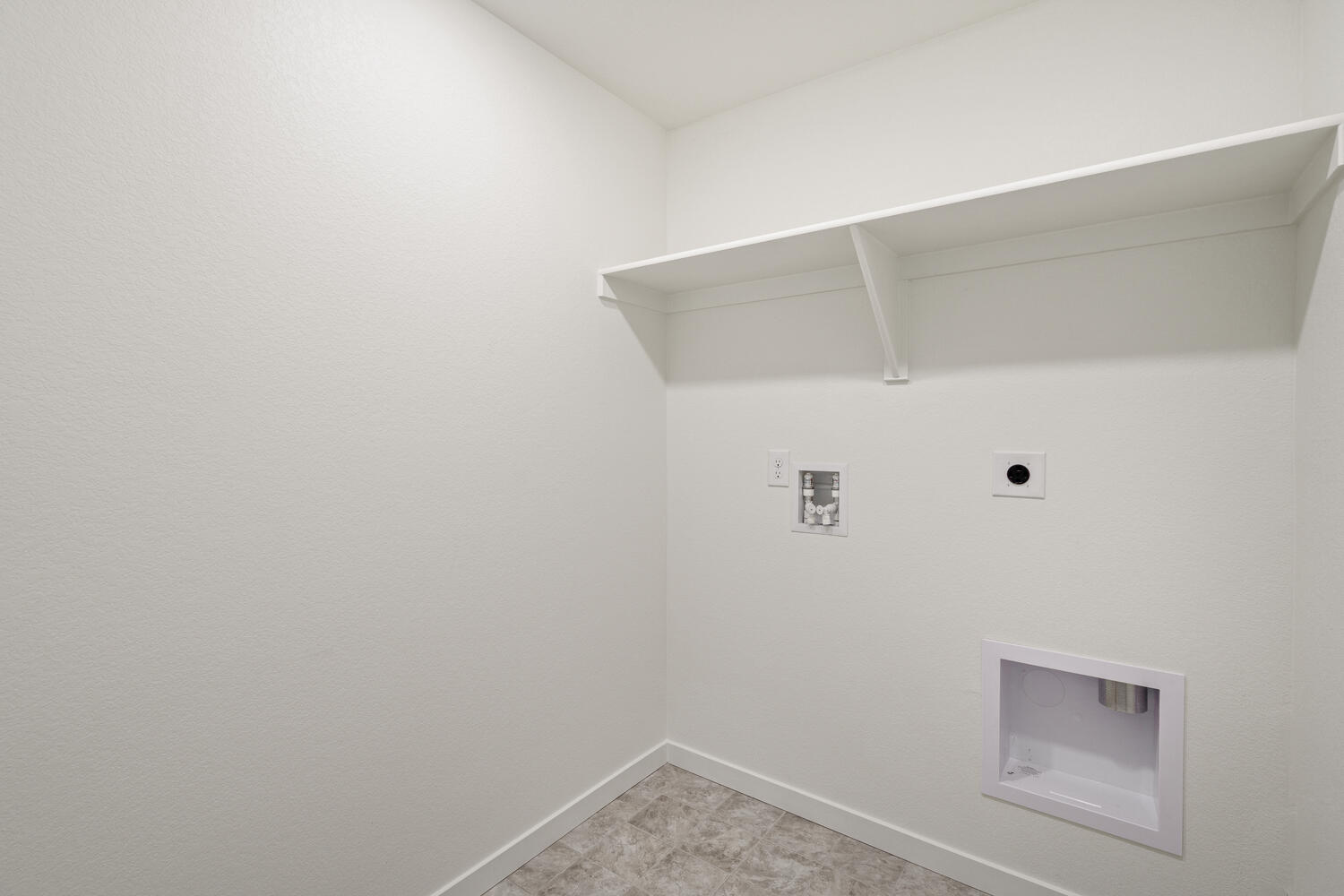 laundry room with washer and dryer hook up