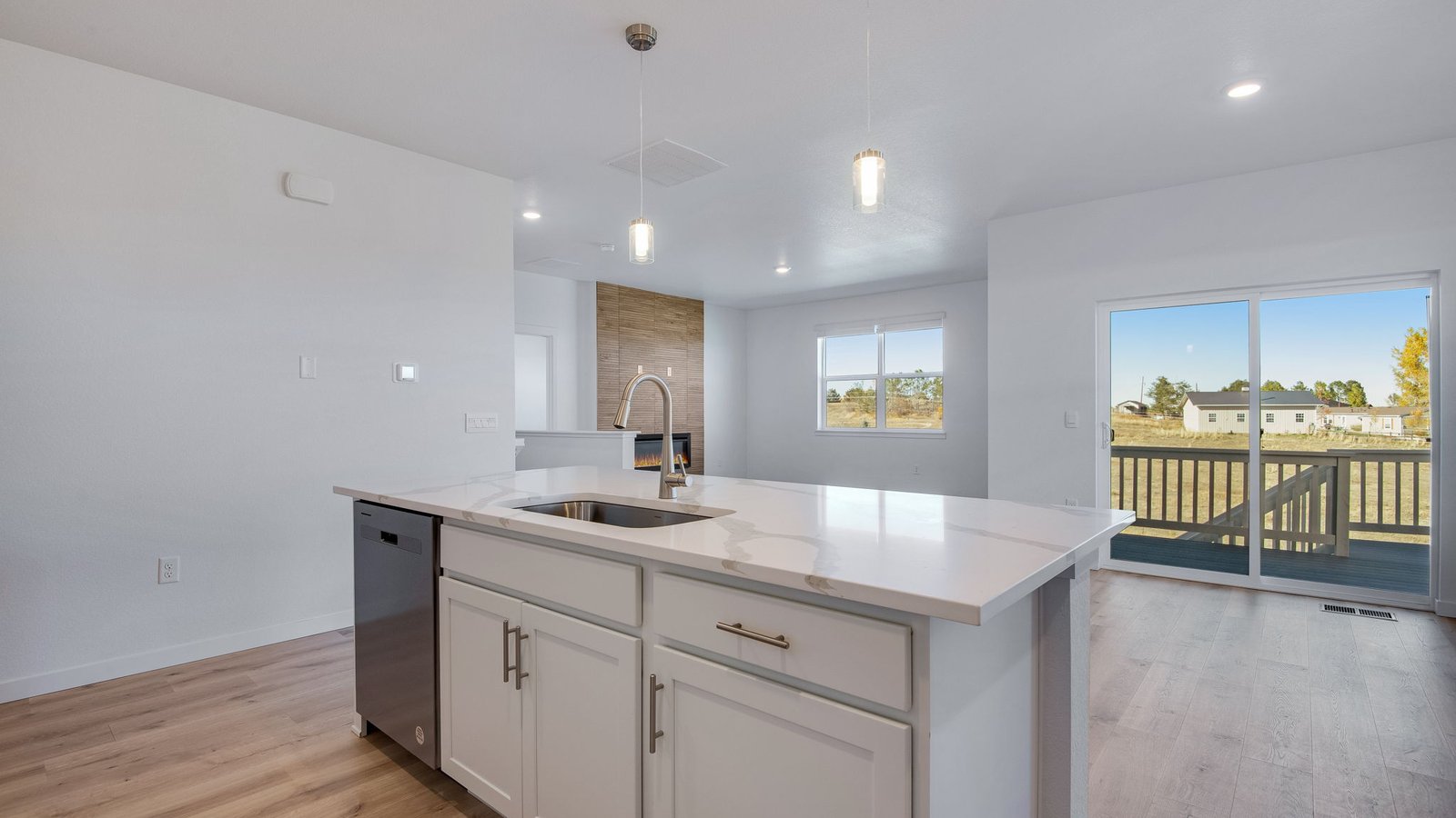 Kitchen with white cabinets in D.R. Horton home