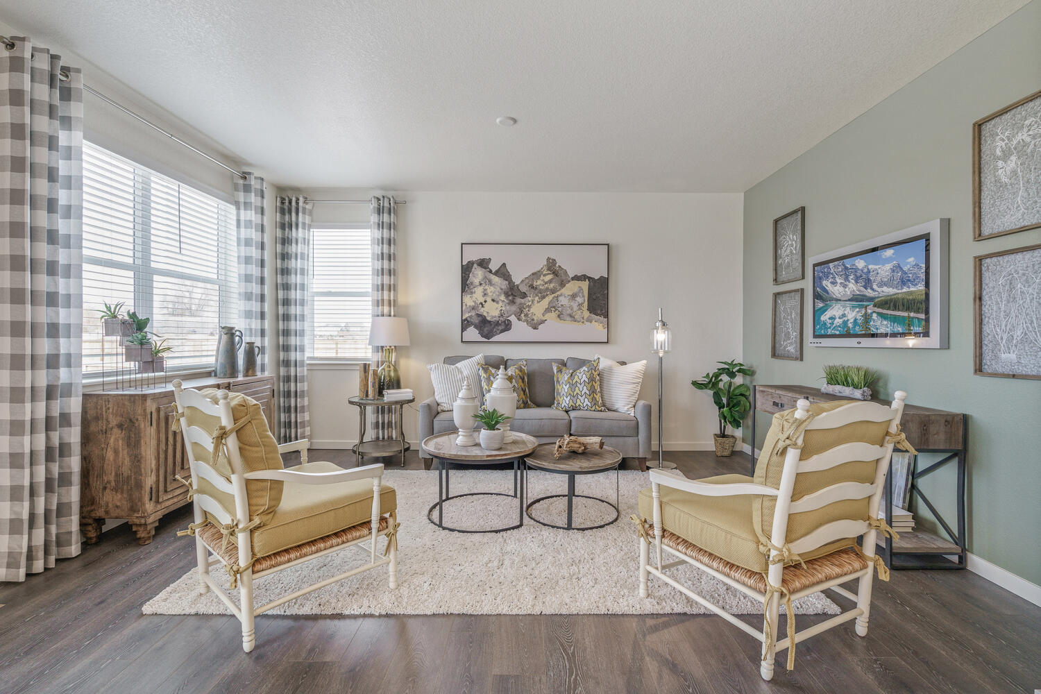 living room with two windows and wood floor