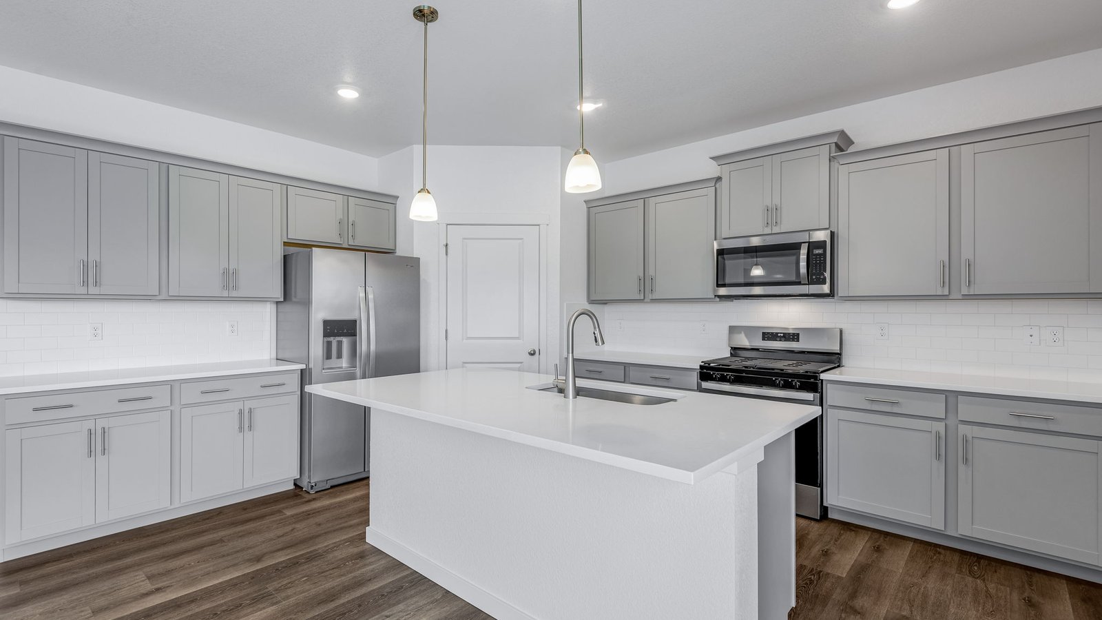 Spacious kitchen with premium cabinetry in new home at Brighton Crossing Community