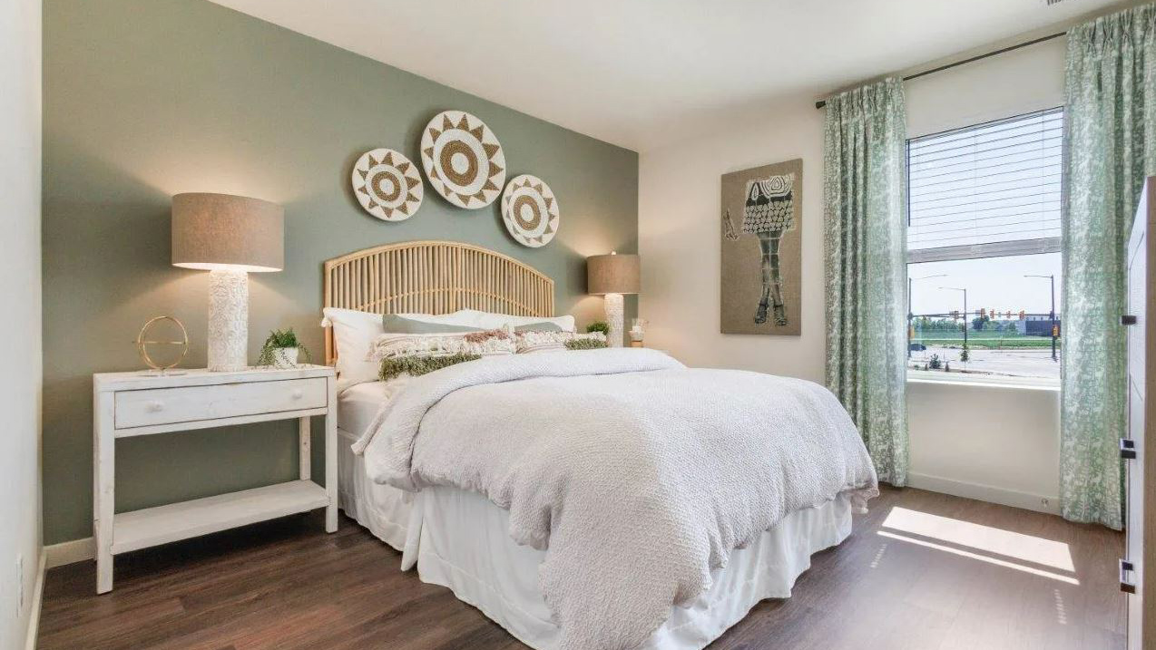 Secondary bedroom with large windows in Brighton Crossing Community new home