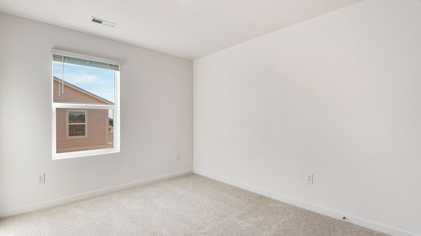 Secondary bedroom in new home community Brighton Crossing