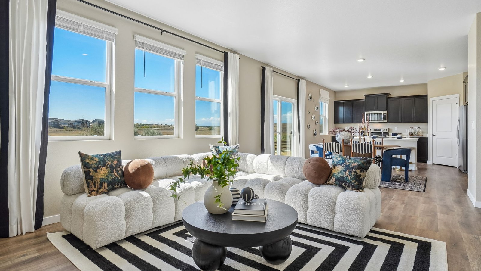 Open concept floor plan with natural light in new home in Brighton Colorado