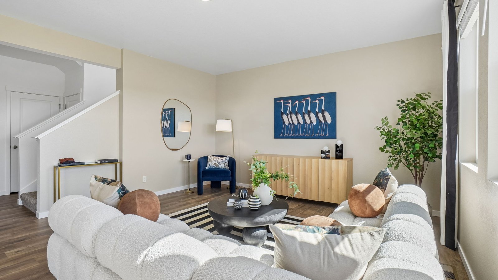 Living room space of new home at Brighton Crossing Community in Colorado