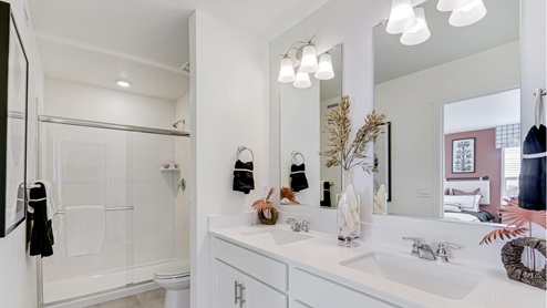 white cabinet bathroom with shower