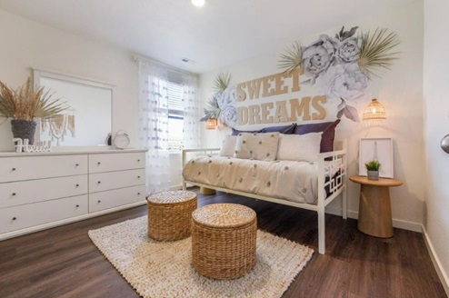 secondary bedroom with nursery decor