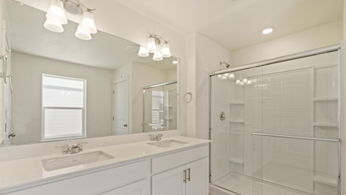 white cabinet bathroom with shower