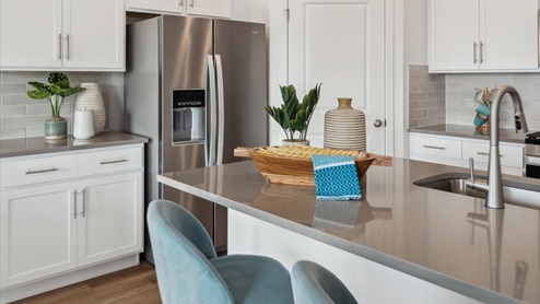 kitchen with white cabinets