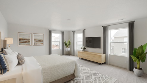 staged large bedroom with three windows and carpet floor