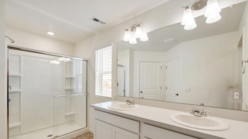 white cabinet kitchen with shower