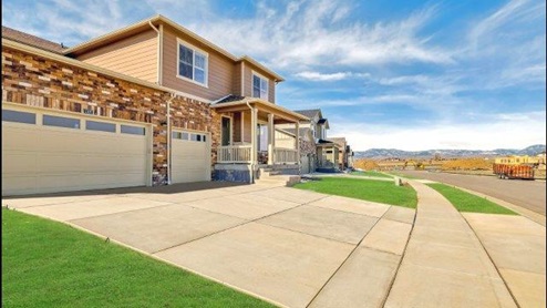 Branson home exterior with view of mountains from drive way
